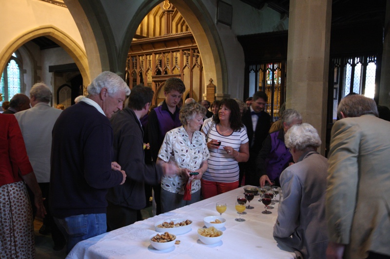 The audience enjoy a glass of wine in the interval during the summer concert, 2012.