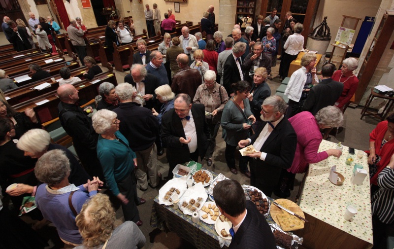 The audience enjoy home-made nibbles at the September concert, 2011.