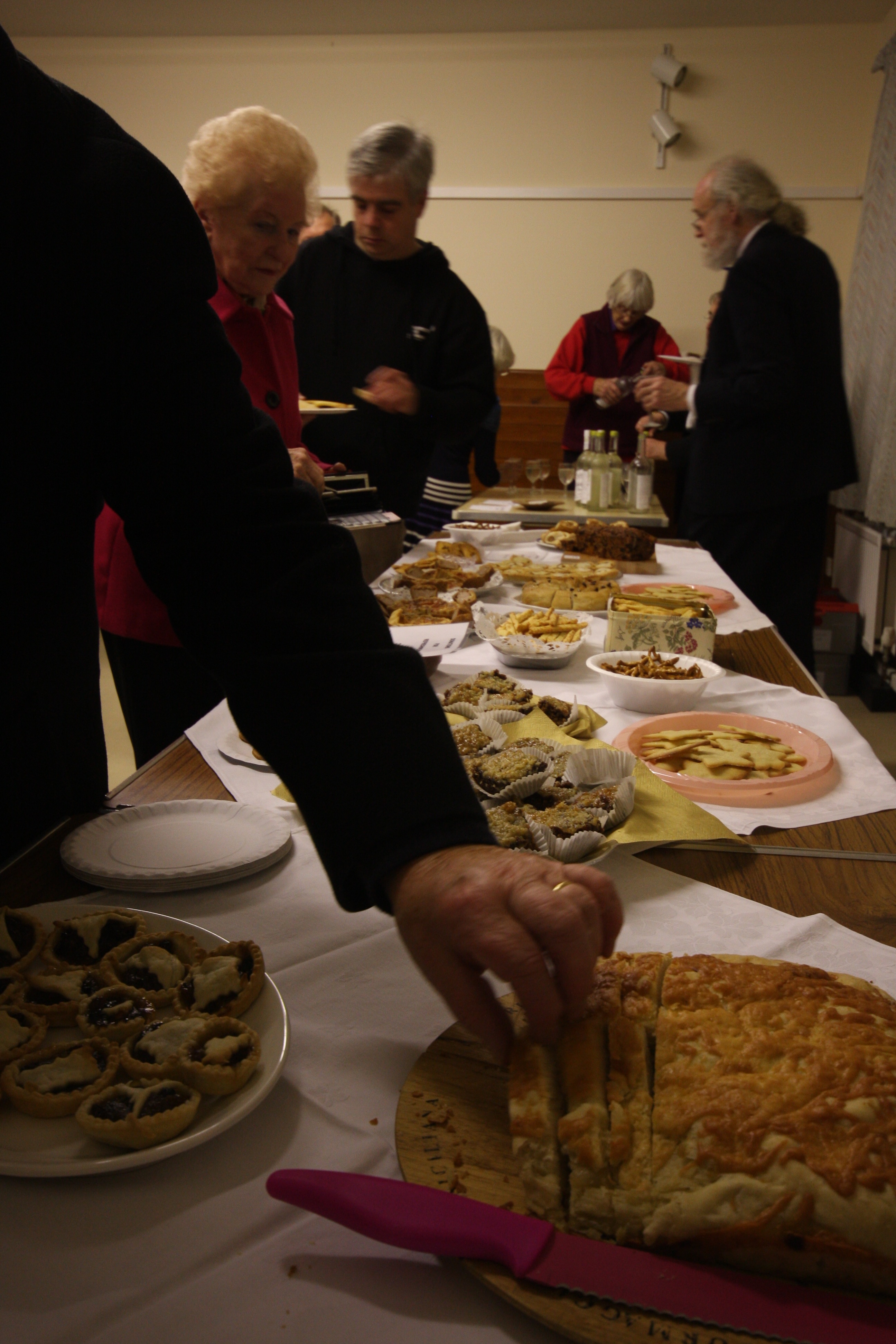 The audience enjoy the usual good spread of home-made nibbles during the interval of the December 2013 concert in Wantage.